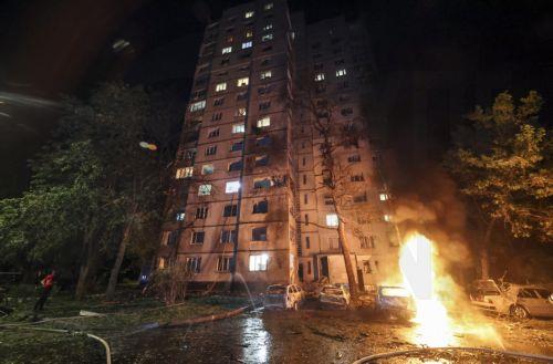 epa13025585 Ukrainian rescuers work at the site of a Russian strike on a residential area in Kharkiv, Ukraine, 09 June 2026, amid the ongoing Russian invasion. At least three people were killed and 18 injured, including two children, as Russia attacked Kharkiv and the region, according to the State Emergency Service.  EPA/SERGEY KOZLOV