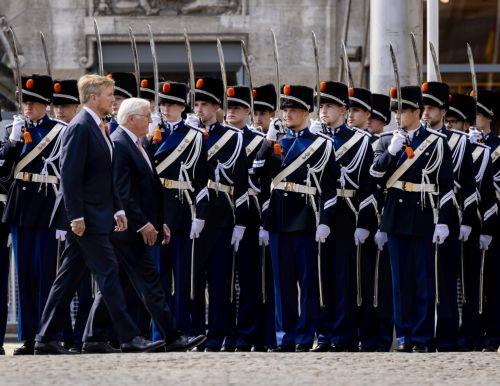 epa13025674 Dutch King Willem-Alexander (L) and German Federal President Frank-Walter Steinmeier (R) inspect the guard of honour during the reception on Dam Square, Amsterdam, The Netherlands, 09 June 2026. Steinmeier is on a three-day state visit to the Netherlands.  EPA/Remko de Waal