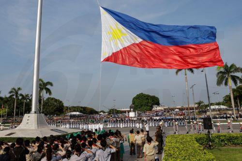 epa13031705 A giant Philippine flag is hoisted during ceremonies marking the 128th Philippine Independence Day anniversary at the Jose Rizal Monument of Luneta Park in Manila, Philippines, 12 June 2026. The Philippines declared independence on 12 June 1898 after more than 300 years of Spanish colonial rule.  EPA/ROLEX DELA PENA