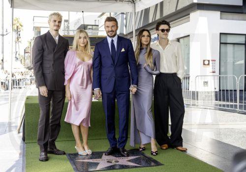 epa13033498 British former soccer player David Beckham (C) poses with his family during a ceremony honoring him with a star on the Hollywood Walk of Fame in Los Angeles, California, USA, 12 June 2026. Beckham was recognized in the Sports Entertainment category.  EPA/TED SOQUI
