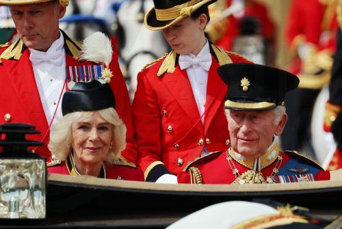 epa13034106 Britain's King Charles III (R) and Queen Camilla (L) depart Buckingham Palace during the Trooping the Colour, The King's Birthday Parade in London, Britain, 13 June 2026. Trooping the Colour is a ceremonial event performed each year by regiments of the Household Division to celebrate the official birthday of the British sovereign.  EPA/ANDY RAIN