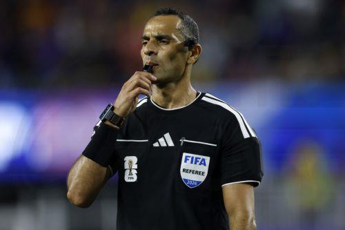 epa13035725 Referee Mustapha Ghorbal whistles during the FIFA World Cup 2026 group stage match Haiti against Scotland, in Foxborough, Massachusetts, USA, 13 June 2026.  EPA/GREG M. COOPER