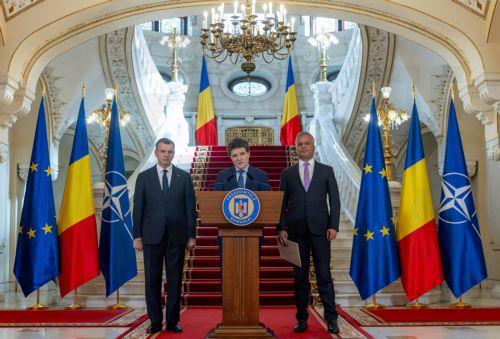 epa13035990 A handout photo made available by the Romanian Presidency shows Romanian President Nicusor Dan (C) nominating liberal politician Adrian Vestea (R) as the second designated prime minister after Eugen Tomac (L), who was nominated to form a technocratic government ten days earlier, failed to secure political support for his proposed cabinet and...