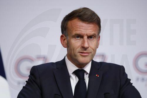 epa13044463 French President Emmanuel Macron attends a press conference at the Hotel Royal during the G7 summit in Evian-les-Bains, France, 17 June 2026. The 52nd G7 Summit takes place in Evian-les-Bains from 15 to 17 June 2026.  EPA/YOAN VALAT