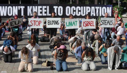 epa13044599 Freedom Flotilla activists and supporters demonstrate in support of Gaza near the European Council headquarters in Brussels, Belgium, 17 June 2026. The protest took place a day ahead of a meeting of European Union leaders in Brussels and follows the interception by Israeli forces of the Freedom Flotilla vessel Madleen while it was attempting to...