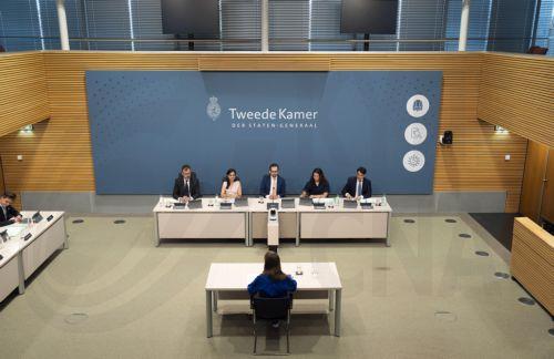 epa13066422 Former National Action Committee for Students (LAKS) chair Nienke Luijckx (C, front) attends a public hearing of the parliamentary inquiry committee into the COVID-19 pandemic policy, in The Hague, the Netherlands, 26 June 2026.  EPA/JEROEN JUMELET