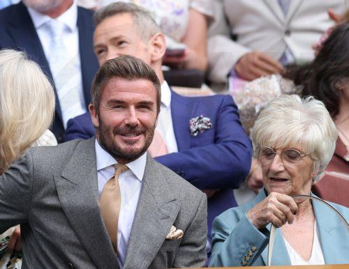 epa13072506 (L-R) David Beckham and his mother Sandra Beckham in the Royal Box at the Men's Singles first round match between Jannik Sinner and Momir Kecmanovic at the Wimbledon Championships in London, Britain, 29 June 2026.  EPA/ADAM VAUGHAN
