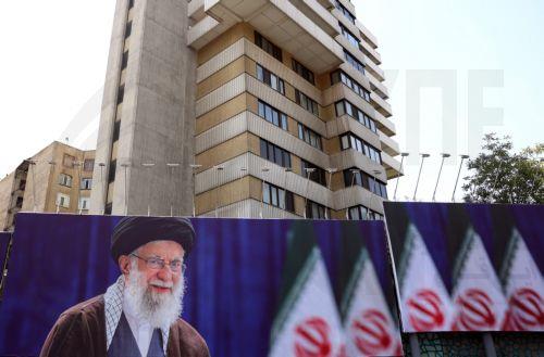 epa13077289 A large-scale poster of late Iranian Supreme Leader Ayatollah Ali Khamenei is displayed along a highway, in Tehran, Iran, 01 July 2026. Iran is set to hold a multi-day state funeral from 04 to 09 July 2026 for late Iranian Supreme Leader Ayatollah Ali Khamenei, who was assassinated on 28 February.  EPA/ABEDIN TAHERKENAREH  -- RESTRICTIONS: NO...