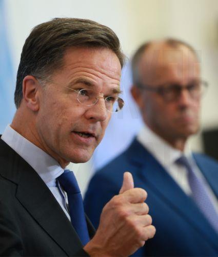 epa13077396 NATO Secretary General Mark Rutte (L) speaks during a press conference with German Chancellor Friedrich Merz following a weekly cabinet meeting of the German government at the Defence Ministry in Berlin, Germany, 01 July 2026. Rutte travelled to Berlin to attend the meeting of the Federal Cabinet.  EPA/HANNIBAL HANSCHKE