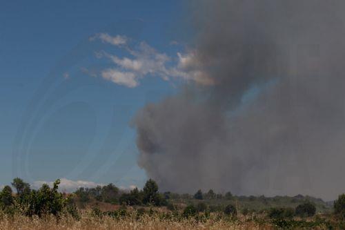epa13080065 Smoke rises from a wildfire burning in Sainte-Valiere, Aude department, southern France, 02 July 2026. A large wildfire has been raging in southern France since 01 July, forcing scores of people to be evacuated, emergency services said.  EPA/CHLOE REULET