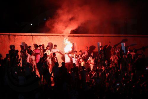 epa13082380 Spectators light flares during a public viewing of the FIFA World Cup 2026 round of 32 match between Algeria and Switzerland at Ferhani Stadium Bab El Ouedin Algiers, Algeria, 03 July 2026. Algeria was eliminated from the 2026 World Cup following a 2-0 defeat to Switzerland in the Round of 32 in Vancouver, Canada.  EPA/MOHAMED MESSARA