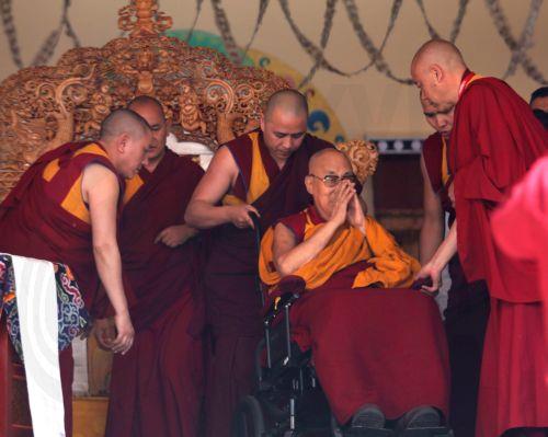 epa13090567 His Holiness the 14th Dalai Lama, Tenzin Gyatso (C-R), blesses Buddhist devotees as he arrives at the venue to celebrate his 91st birthday during a public ceremony at the Jivetsal Teaching Ground in Choglamsar, near Leh, Ladakh, India, 06 July 2026. The birthday celebrations, jointly organised by the Ladakh Buddhist Association, the All Ladakh...