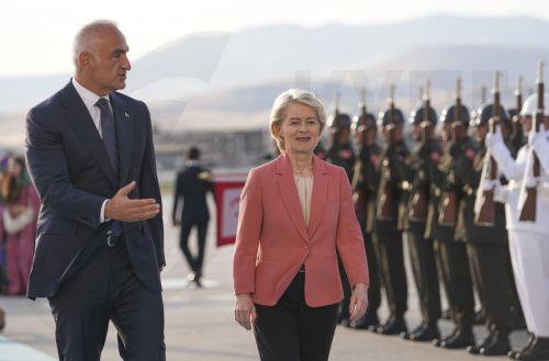 epa13092288 European Commission President Ursula von der Leyen (C) is welcomed by Turkish Minister of Culture and Tourism, Mehmet Nuri Ersoy (L), at Esenboga Airport ahead of the 36th NATO Heads of State and Government Summit in Ankara, Turkiye, 06 July 2026. The summit will take place on 07–08 July, focusing on strengthening defense industrial production...