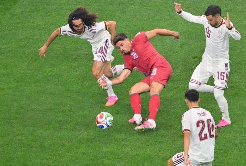 epa13092527 Marc Cucurella of Spain (L) and Pedro Neto of Portugal in action during the FIFA World Cup 2026 Round of 16 match Portugal against Spain, in Dallas, USA, 06 July 2026.  EPA/SAM WASSON