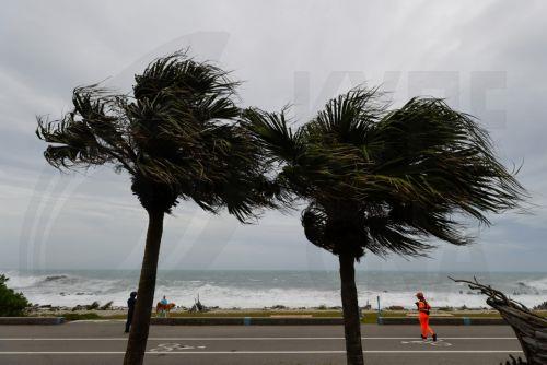 epa13101941 A Taiwanese coast guard personnel patrols at the coastal area as huge waves brought by Typhoon Bavi hit the shore in Hualien city, Taiwan, 10 July 2026. The Central Weather Administration (CWA) issued a land warning at 5:30 a.m. on Friday for Typhoon Bavi. The storm is moving northwest at 25 kilometres per hour and is expected to hit Taiwan...