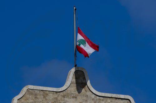 epa13108080 The Lebanese national flag flies at half-mast at the Government Palace in Beirut, Lebanon, 13 July 2026. Lebanese Prime Minister Nawaf Salam issued a memorandum declaring official mourning following the death of former Emir of Qatar Sheikh Hamad bin Khalifa Al Thani, who died 12 July 2026 at the age of 74, according to Qatar's Amiri Diwan. ...