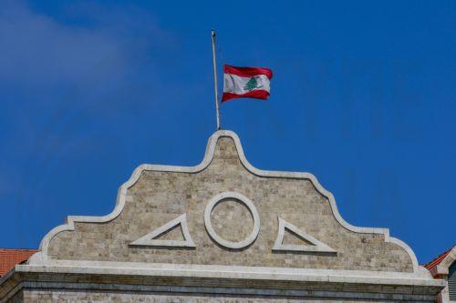 epa13108081 The Lebanese national flag flies at half-mast at the Government Palace in Beirut, Lebanon, 13 July 2026. Lebanese Prime Minister Nawaf Salam issued a memorandum declaring official mourning following the death of former Emir of Qatar Sheikh Hamad bin Khalifa Al Thani, who died 12 July 2026 at the age of 74, according to Qatar's Amiri Diwan. ...
