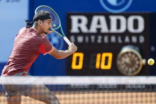 epa13108106 Lorenzo Sonego of Italy in action against Joel Schwaerzler of Austria during their men's single match at the Swiss Open tennis tournament in Gstaad, Switzerland, 13 July 2026.  EPA/PETER SCHNEIDER