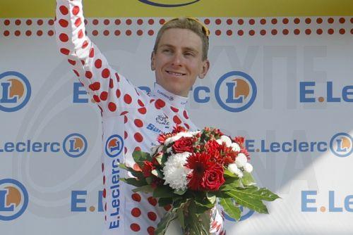 epa13113184 Slovenian cyclist Tadej Pogacar of UAE Team Emirates XRG celebrates on the podium wearing the best climber's polka dot jersey after Stage 11 of the Tour de France, a 161.3 km route from Vichy to Nevers, France, 15 July 2026.  EPA/GUILLAUME HORCAJUELO