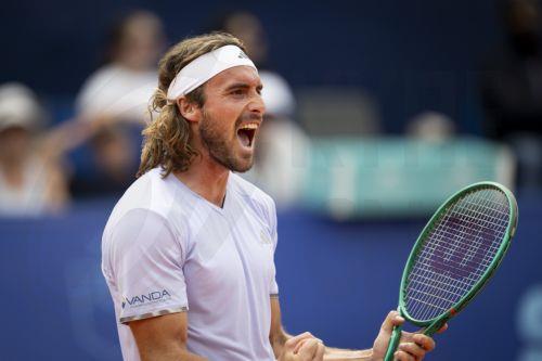 epa13115230 Stefanos Tsitsipas of Greece celebrates after winning his Round of 16 match against Jerome Kym of Switzerland at the Swiss Open tennis tournament in Gstaad, Switzerland, 16 July 2026.  EPA/ANTHONY ANEX