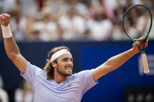 epa13115231 Stefanos Tsitsipas of Greece celebrates after winning his Round of 16 match against Jerome Kym of Switzerland at the Swiss Open tennis tournament in Gstaad, Switzerland, 16 July 2026.  EPA/ANTHONY ANEX
