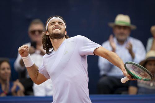 epa13115232 Stefanos Tsitsipas of Greece celebrates after winning his Round of 16 match against Jerome Kym of Switzerland at the Swiss Open tennis tournament in Gstaad, Switzerland, 16 July 2026.  EPA/ANTHONY ANEX