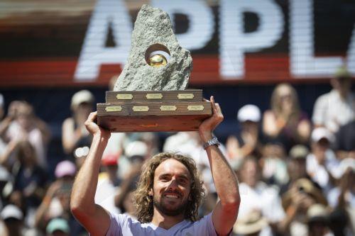 epa13120276 Stefanos Tsitsipas of Greece poses with the trophy after his victory in the men's final match against Raphael Collignon of Belgium at the Swiss Open tennis tournament in Gstaad, Switzerland, 19 July 2026.  EPA/ANTHONY ANEX