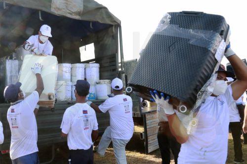 epa13124120 Cambodian officials prepare to burn seized illegal drugs during a drug destruction event in Kandal province, Cambodia, 21 July 2026. The Cambodian National Authority for Combating Drugs destroyed nearly five tons of illegal drug substance ingredients in an effort to fight against drug production, distribution and drug trafficking.  EPA/KITH SEREY