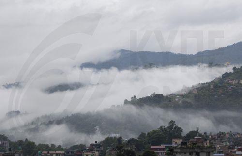 epa13124218 Monsoon clouds drift over the hills surrounding Kathmandu, Nepal, 21 July 2026. Nepal's Meteorological Forecasting Division has announced that the monsoon season has officially begun across the country.  EPA/NARENDRA SHRESTHA