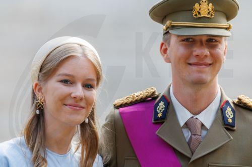 epa13124366 Princess Eleonore (L) and Prince Gabriel greet people outside the St. Michael & St. Gudula Cathedral after the Te Deum mass during Belgium's National Day celebrations in Brussels, Belgium, 21 July 2026.  EPA/OLIVIER MATTHYS