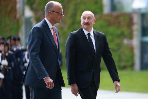 epa13124406 German Chancellor Friedrich Merz (L) welcomes Azerbaijani President Ilham Aliyev with military honors at the Chancellery in Berlin, Germany, 21 July 2026. Merz and Aliyev met for bilateral talks.  EPA/CLEMENS BILAN