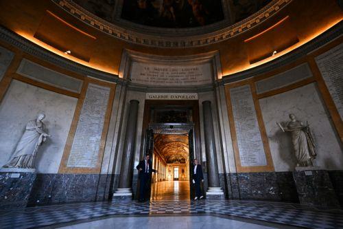 epa13125913 Louvre's President Christophe Leribault (L) and France's Culture Minister Catherine Pegard (R) open the doors during the reopening of the Apollo Gallery at the Louvre Museum in Paris, France, 22 July 2026, after a heist in October 2025 in which French crown jewels were stolen.  EPA/LOU BENOIST / POOL  MAXPPP OUT