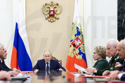 epa13128070 Russian President Vladimir Putin chairs a meeting with members of the Security Council at the Kremlin in Moscow, Russia, 23 July 2026.  EPA/ALEXANDER KAZAKOV / SPUTNIK / KREMLIN POOL MANDATORY CREDIT