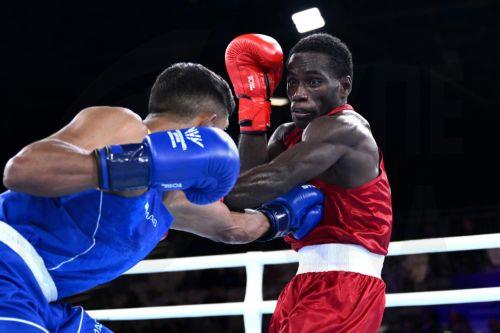 epa13132982 Max Makana (R) of Solomon Islands fights Ravindu Jayantha of Sri Lanka during the Men's 60kg Round of 32 match on day two of the Glasgow 2026 Commonwealth Games at the SEC Centre in Glasgow, Scotland, 25 July 2026.  EPA/JOEL CARRETT AUSTRALIA AND NEW ZEALAND OUT
