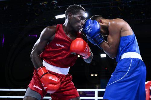 epa13132983 Max Makana (L) of Solomon Islands fights Ravindu Jayantha of Sri Lanka during the Men's 60kg Round of 32 match on day two of the Glasgow 2026 Commonwealth Games at the SEC Centre in Glasgow, Scotland, 25 July 2026.  EPA/JOEL CARRETT AUSTRALIA AND NEW ZEALAND OUT