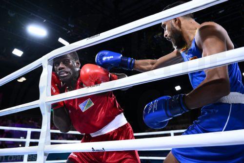 epa13132985 Max Makana (L) of Solomon Islands fights Ravindu Jayantha of Sri Lanka during the Men's 60kg Round of 32 match on day two of the Glasgow 2026 Commonwealth Games at the SEC Centre in Glasgow, Scotland, 25 July 2026.  EPA/JOEL CARRETT AUSTRALIA AND NEW ZEALAND OUT