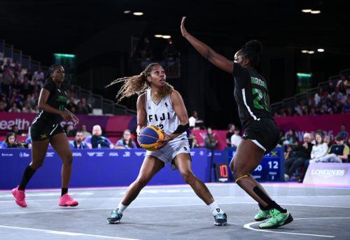 epa13134999 Bulou Tuisue (C) of Fiji in the 3X3 Basketball Pool Round match against Jamaica at SEC Centre Hall 4 during the Glasgow 2026 Commonwealth Games in Glasgow, Britain, 26  July 2026.  EPA/JOEL CARRETT AUSTRALIA AND NEW ZEALAND OUT