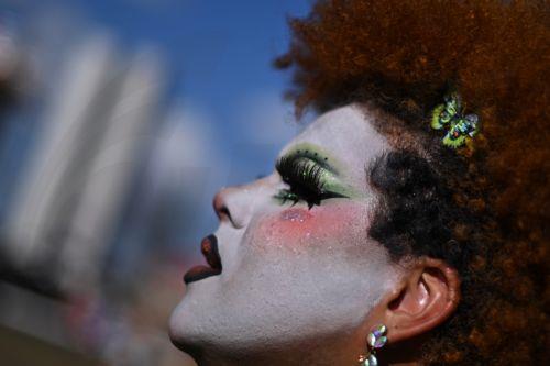 epaselect epa13134875 A person participates in the LGBT Pride march on the Esplanade of the Ministries in Brasilia, Brazil, 26 July 2026.  EPA/Andre Borges