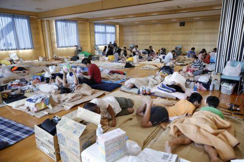 epa13141137 Earthquake affected locals shelter in Matsubashi-higashi Emergency Control Center in Uki, Kumamoto Prefecture, southwestern Japan, 30 July 2026. Rescue operations continue across Kumamoto Prefecture, where more than a dozen people have died and several others were injured following a 7.1-magnitude earthquake that damaged critical infrastructure,...