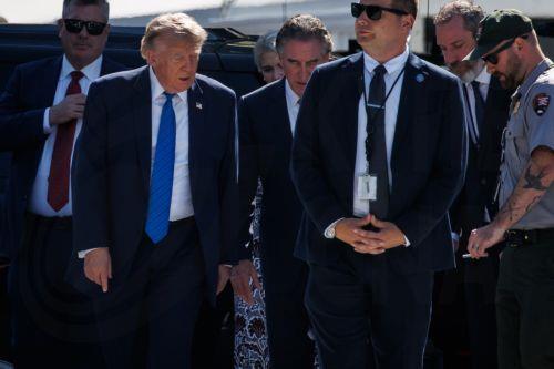epa13144167 US President Donald Trump (C-L) inspects some of the restoration work being done on the White House with US Secretary of the Interior Doug Burgum (C-R) before departing for Camp David, in Washington, D.C., USA, 31 July 2026. Trump is holding a cabinet meeting at Camp David before heading to his private golf course in Bedminster, New Jersey where...