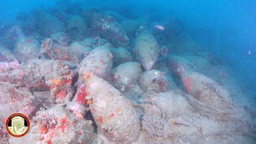 epa13158824 An undated handout photo made available by the Carabinieri Command for the Protection of Cultural Heritage (Carabinieri T.P.C.) on 10 August 2026 shows amphoras from a Roman-era shipwreck nearly 50 meters underwater off the coast of Mazara del Vallo, Sicily island, Italy. Divers from the Italian police have uncovered the wreck of a ship believed...
