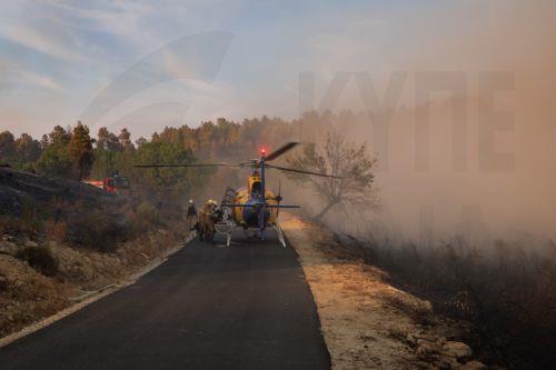 epa13176363 A helicopter is prepared to fight the flames of a forest fire in Vilarinho da Castanheira, Portugal, 17 August 2026. The fire started in Torre de Moncorvo and spread to the municipality of Carrazeda de Ansiaes.  EPA/PEDRO SARMENTO COSTA