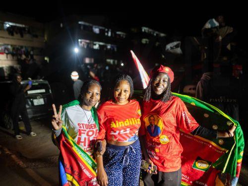 epa13176536 Students at the University of Zambia (UNZA) pose for a photograph amid celebrations following the announcement of presidential election results in Lusaka, Zambia, 18 August 2026. Incumbent President Hakainde Hichilema of the United Party for National Development (UPND) secured a second term in office with 60% of the vote over Brian Mundubile of...