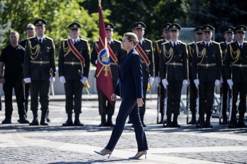 epa13186121 Danish Prime Minister Mette Frederiksen attends the ceremony of the National Flag raising in Kyiv, Ukraine, 23 August 2026, amid the ongoing Russian invasion. Ukraine celebrates the National Flag Day on 23 August every year.  EPA/Maxym Marusenko