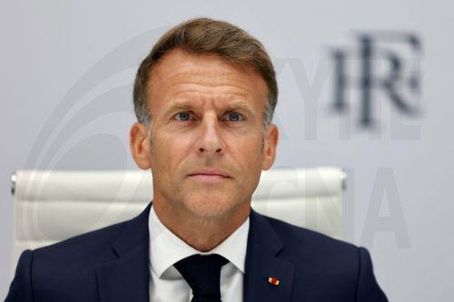 epa13188697 French President Emmanuel Macron co-chairs a video conference meeting of the Coalition of the Willing group of pro-Ukrainian countries to mark the 35th anniversary of Ukraine's independence, at the Elysee Palace in Paris, France, 24 August 2026. While the British prime minister chairs the meeting on the ground in Kyiv, the French president and...