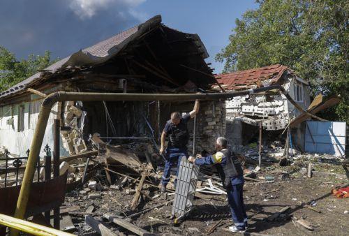 epa13194382 Ukrainian communal workers operate at the site of a Russian strike on private buildings near Kyiv, Ukraine, 27 August 2026, amid the Russian invasion. After the overnight Russian combined shelling, Ukrainian rescuers are working at 9 locations. Among them are private homes, warehouses, and fire outbreaks in ecosystems, according to the Ukrainian...