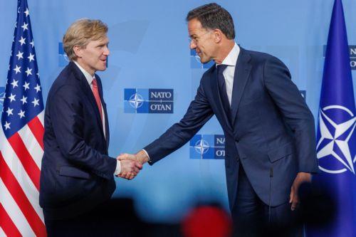 epa13194404 US Under Secretary of War for Policy Elbridge Colby (L) shakes hands with NATO Secretary General Mark Rutte during a meeting at the North Atlantic Treaty Organization (NATO) headquarters, in Brussels, Belgium, 27 August 2026. Colby will later participate in a meeting of the North Atlantic Council with Allied Ambassadors.  EPA/OLIVIER MATTHYS
