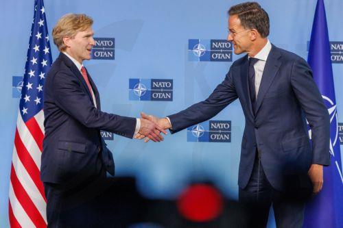 epa13194410 US Under Secretary of War for Policy Elbridge Colby (L) shakes hands with NATO Secretary General Mark Rutte during a meeting at the North Atlantic Treaty Organization (NATO) headquarters, in Brussels, Belgium, 27 August 2026. Colby will later participate in a meeting of the North Atlantic Council with Allied Ambassadors.  EPA/OLIVIER MATTHYS