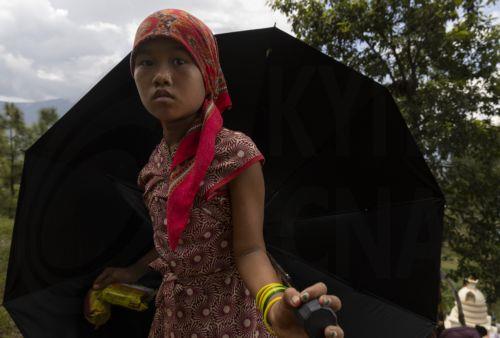 epa13196535 A girl makes her way on a higher ground following another flash flood alert in Nuwakot district, Nepal, 28 August 2026. More than 460 people have died and hundreds remain missing across northern Nepal after a suspected avalanche triggered massive flash floods and mudslides along the Bhotekoshi and Trishuli river near the Nepal-Tibet border,...