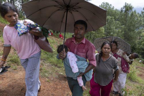 epa13196537 People make their way on a higher ground following another flash flood alert in Nuwakot district, Nepal, 28 August 2026. More than 460 people have died and hundreds remain missing across northern Nepal after a suspected avalanche triggered massive flash floods and mudslides along the Bhotekoshi and Trishuli river near the Nepal-Tibet border,...